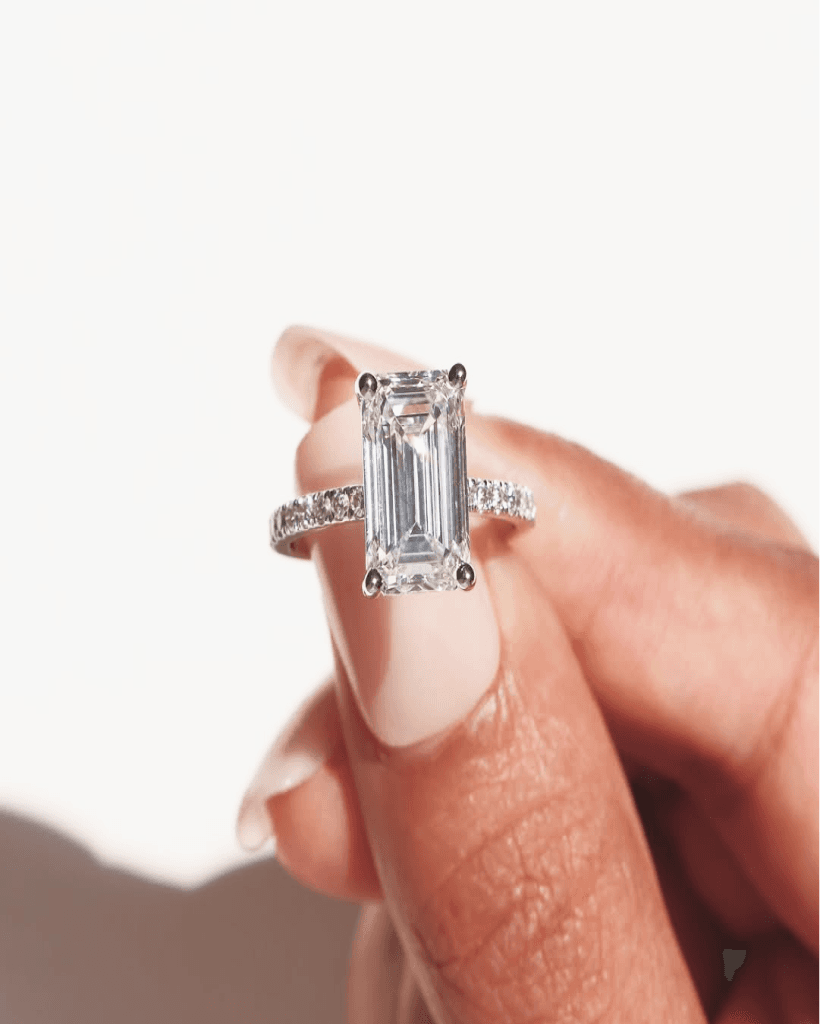 Moissanite engagement ring on hand