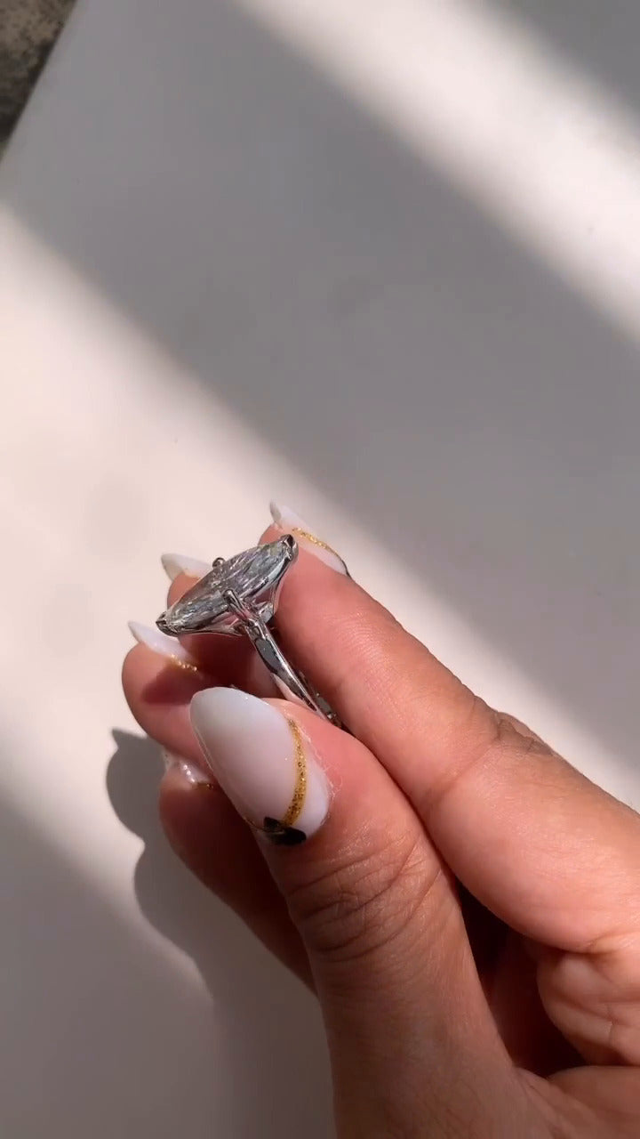 Dasha Solitaire Moissanite Engagement Ring