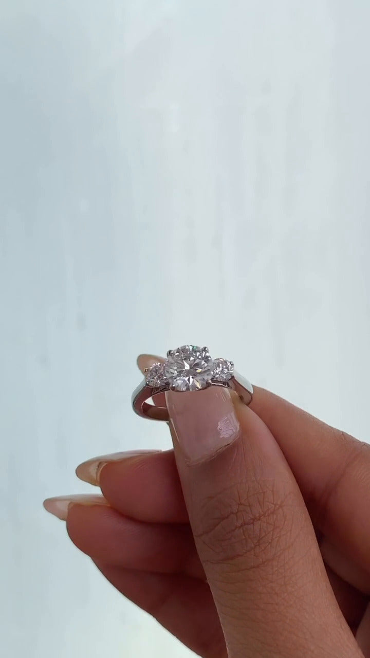 Round Three Stone Engagement Ring
